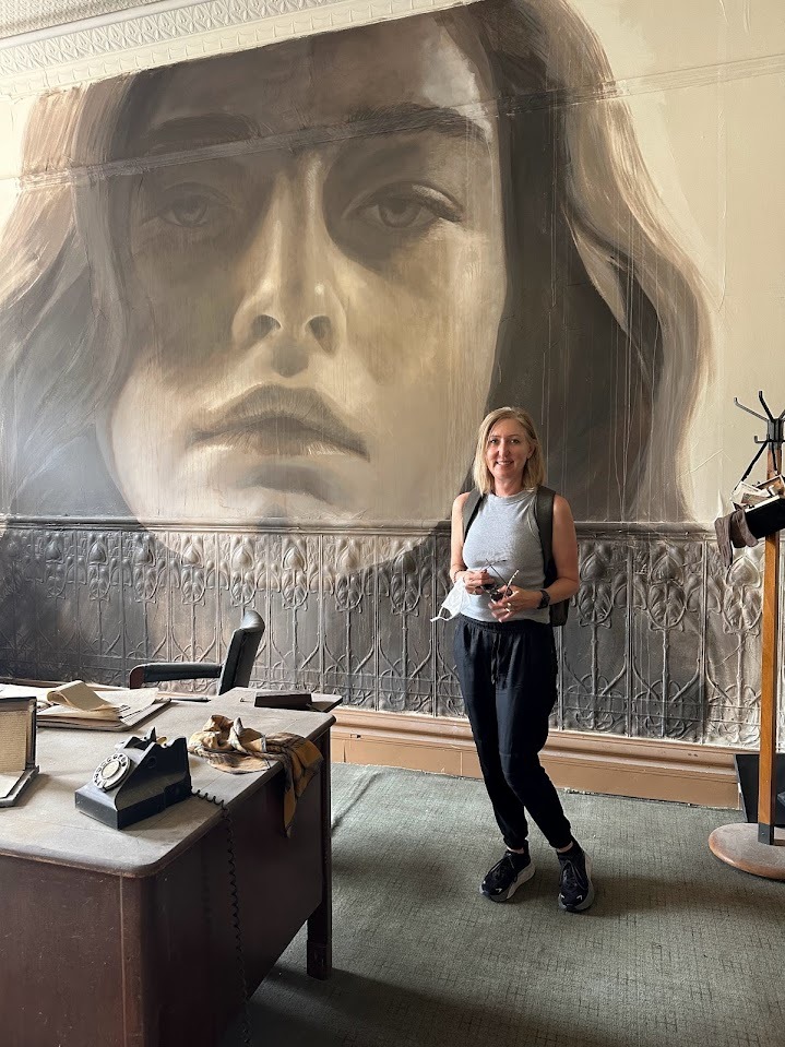Katrina with face on wall